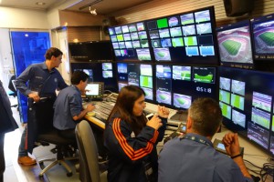 The production team from Sportv puts the final touches on the vision mixer for tomorrow's big match.