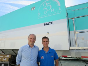Dan Miodownik (left) , HBS project director, and Jorg Sander, HBS director of operations, in front of the Dome production truck being used to produce events out of BC Place in Vancouver