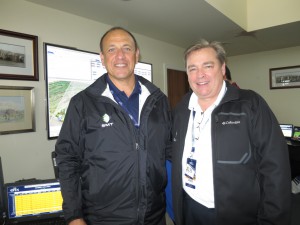 SMT’s Rallis Pappas (left) and Gerard J. Hall inside the company’s operations area at The Open in St. Andrews.