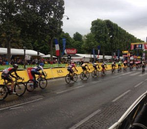 TdF participants undertake one of the 10 7km laps around the Champs-Élysées as the end of the 2015 event approaches. (Pic: David Davies)