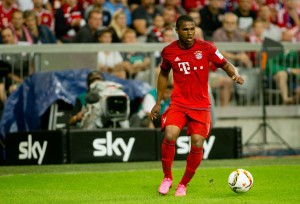 Douglas Costa of Muenchen in action during the Bundesliga match between FC Bayern Muenchen and Hamburger SV at Allianz Arena  on August 14, 2015 in Munich, Germany.  (Photo by Johannes Simon/Bundesliga/DFL via Getty Images) *** Local Caption *** Douglas Costa
