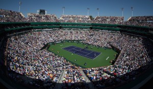 A capacity crowd of 16,000 fans watch the BNP Paribas Open semifinal match between John Isner of the US and Serbia's Novak Djokovic of Serbia at the Indian Wells Tennis Garden on March 15, 2014 in Indian Wells, California.     (Photo credit: JOE KLAMAR/AFP/Getty Images)