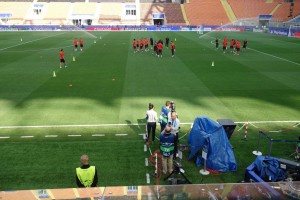 Athletico Madrid players warm up in the San Siro, Match Day-1