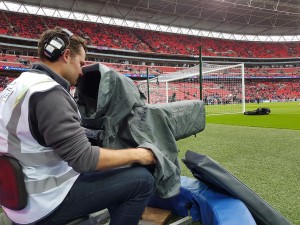 Getting the low down: One of Timeline’s cameramen at Wembley