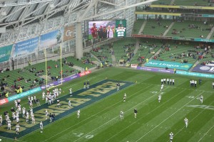 Daktronics screen displays American Football scoring graphics in the stadium