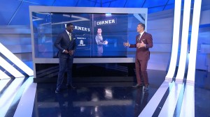 NFL GameDay talent Michael Irvin (left) and Kurt Warner in front of a Planar LookThru OLED monitor