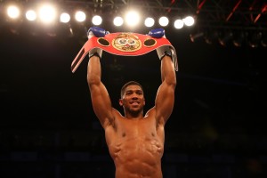 LONDON, ENGLAND - APRIL 09: Anthony Joshua of England celebrates with the belt after defeating Charles Martin of the United States in action during the IBF World Heavyweight title fight at The O2 Arena on April 9, 2016 in London, England. (Photo by Richard Heathcote/Getty Images)